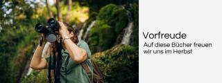 Frau mit Fernglas. Header unseres Onlineschaufensters Vorfreude.
